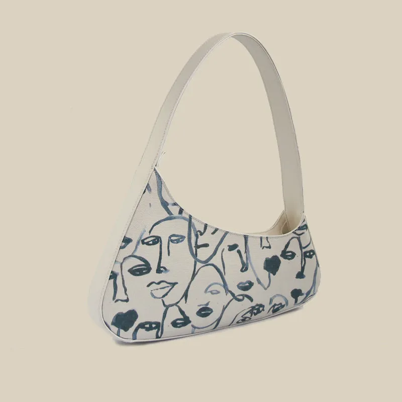 Judith – Artistic Canvas Shoulder Bag with Abstract Face Design