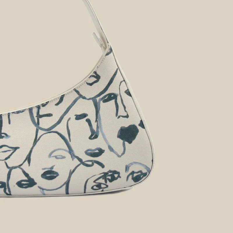Judith – Artistic Canvas Shoulder Bag with Abstract Face Design