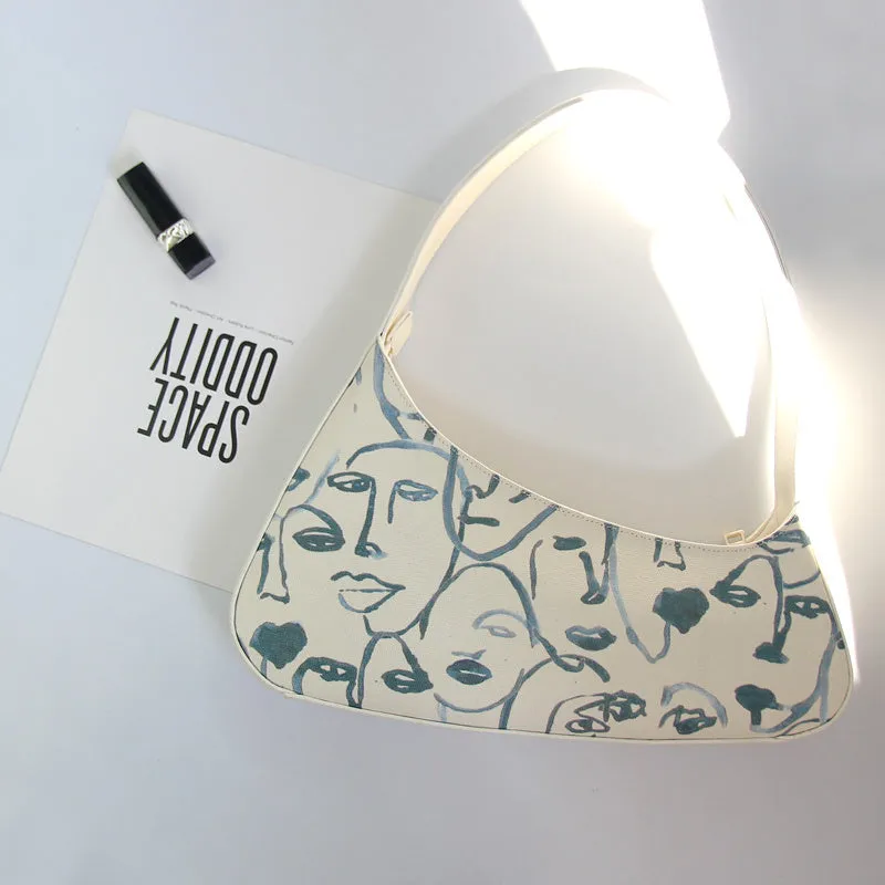 Judith – Artistic Canvas Shoulder Bag with Abstract Face Design