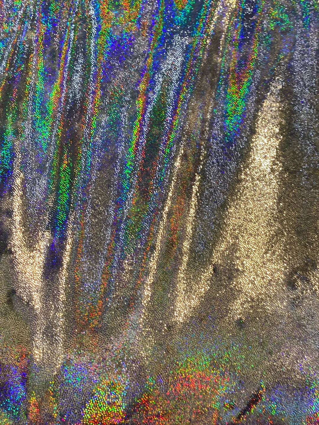 Velvet fabric with black iridescent, shiny mirror designs, stretches to all 4 sides sold by the yard