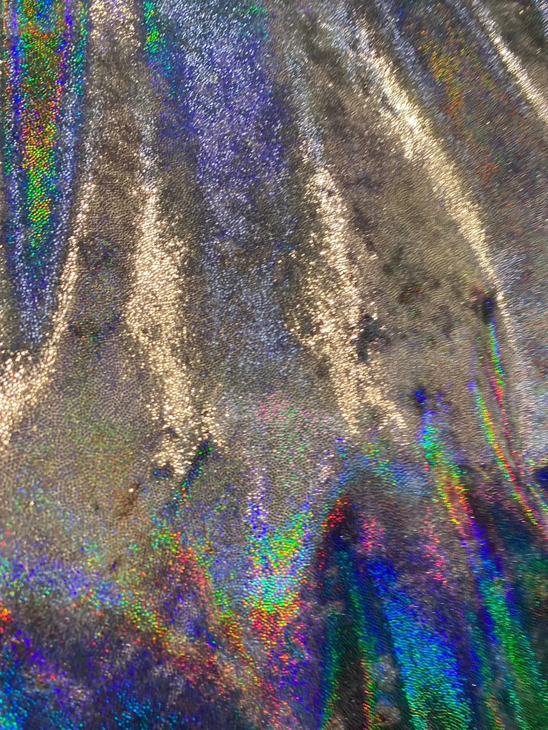 Velvet fabric with black iridescent, shiny mirror designs, stretches to all 4 sides sold by the yard
