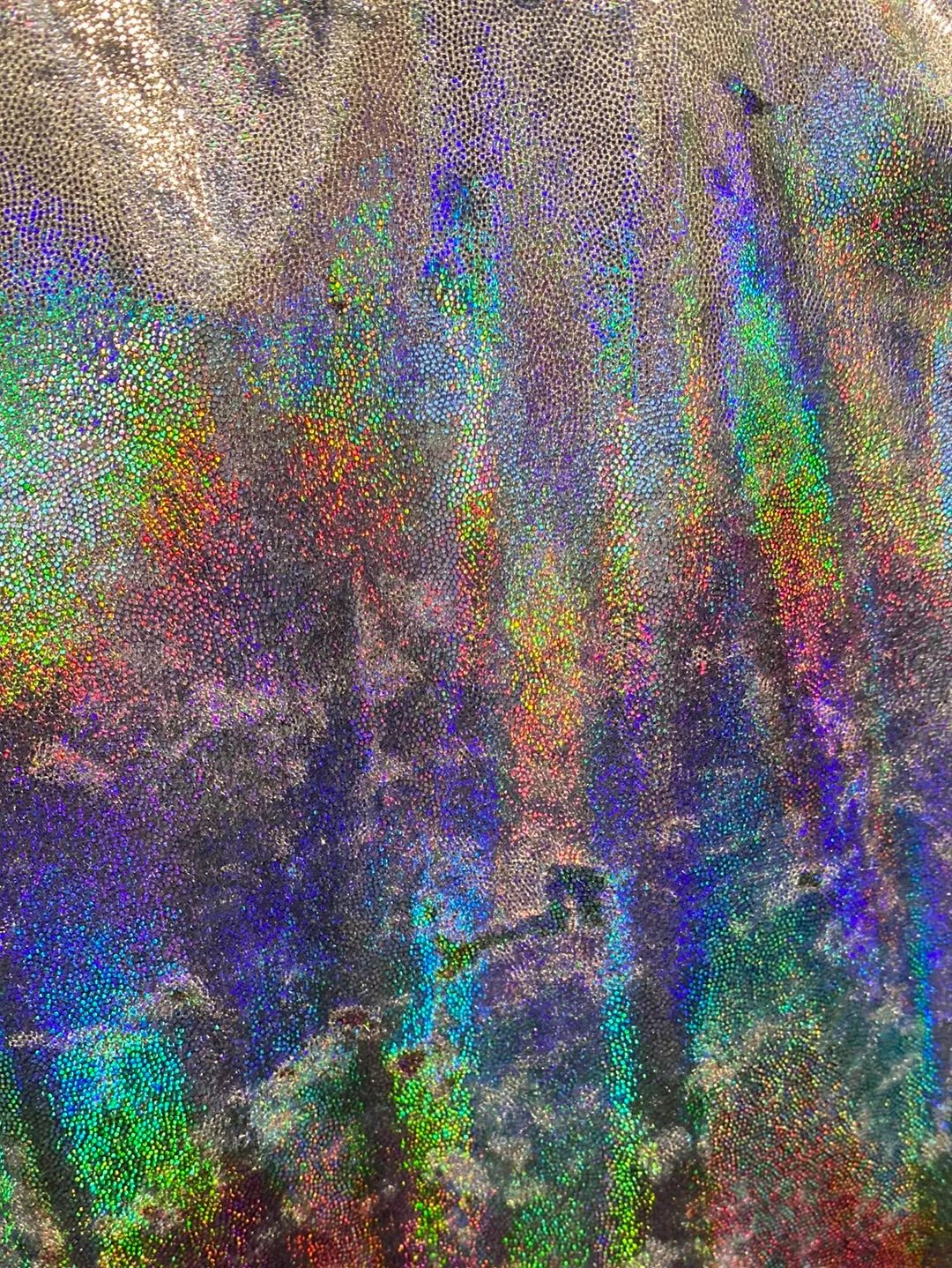 Velvet fabric with black iridescent, shiny mirror designs, stretches to all 4 sides sold by the yard
