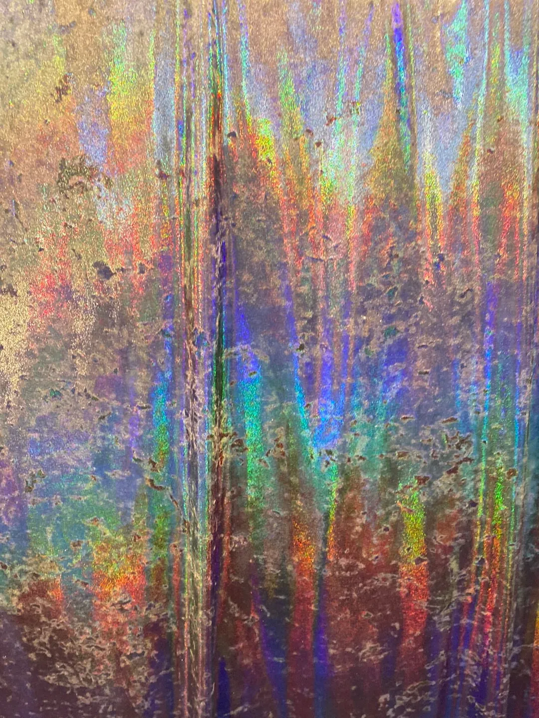 Velvet fabric with black iridescent, shiny mirror designs, stretches to all 4 sides sold by the yard